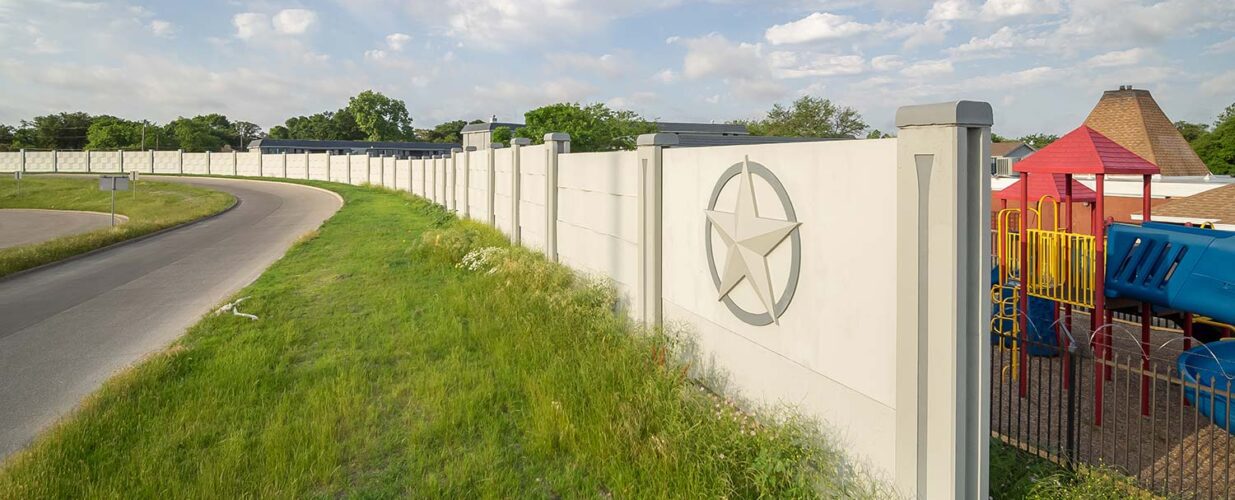 retaining wall by playground near IH-635